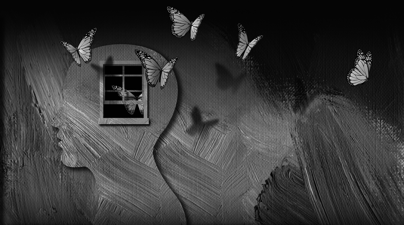 Butterflies flutter around a silhouette of a head in profile view