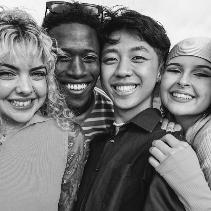 Young people smiling together